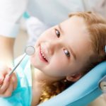 photodune little girl visiting dentist s